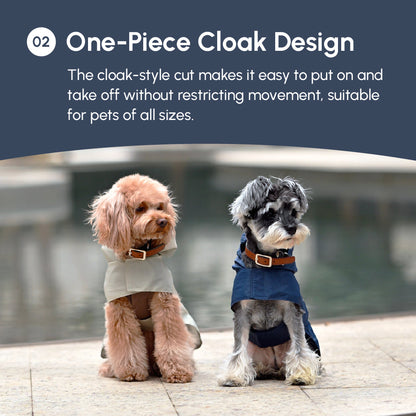 Two dogs wearing cloaks outdoors with text about one-piece cloak design.
