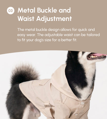 Dog wearing a beige raincoat with metal buckle and adjustable waist, on a plain background.