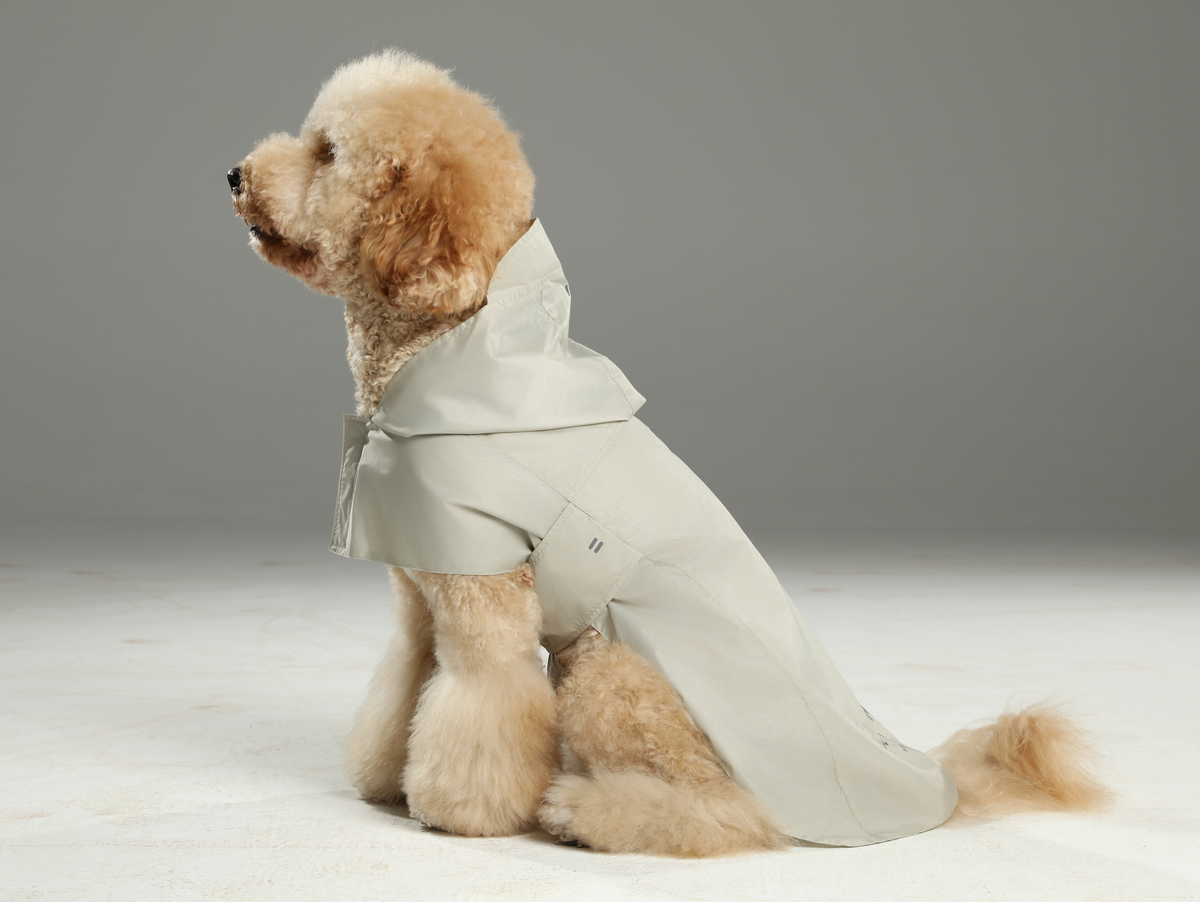 Beige capsule waterproof foldable dog raincoat cloak design with reflective strips adjustable straps