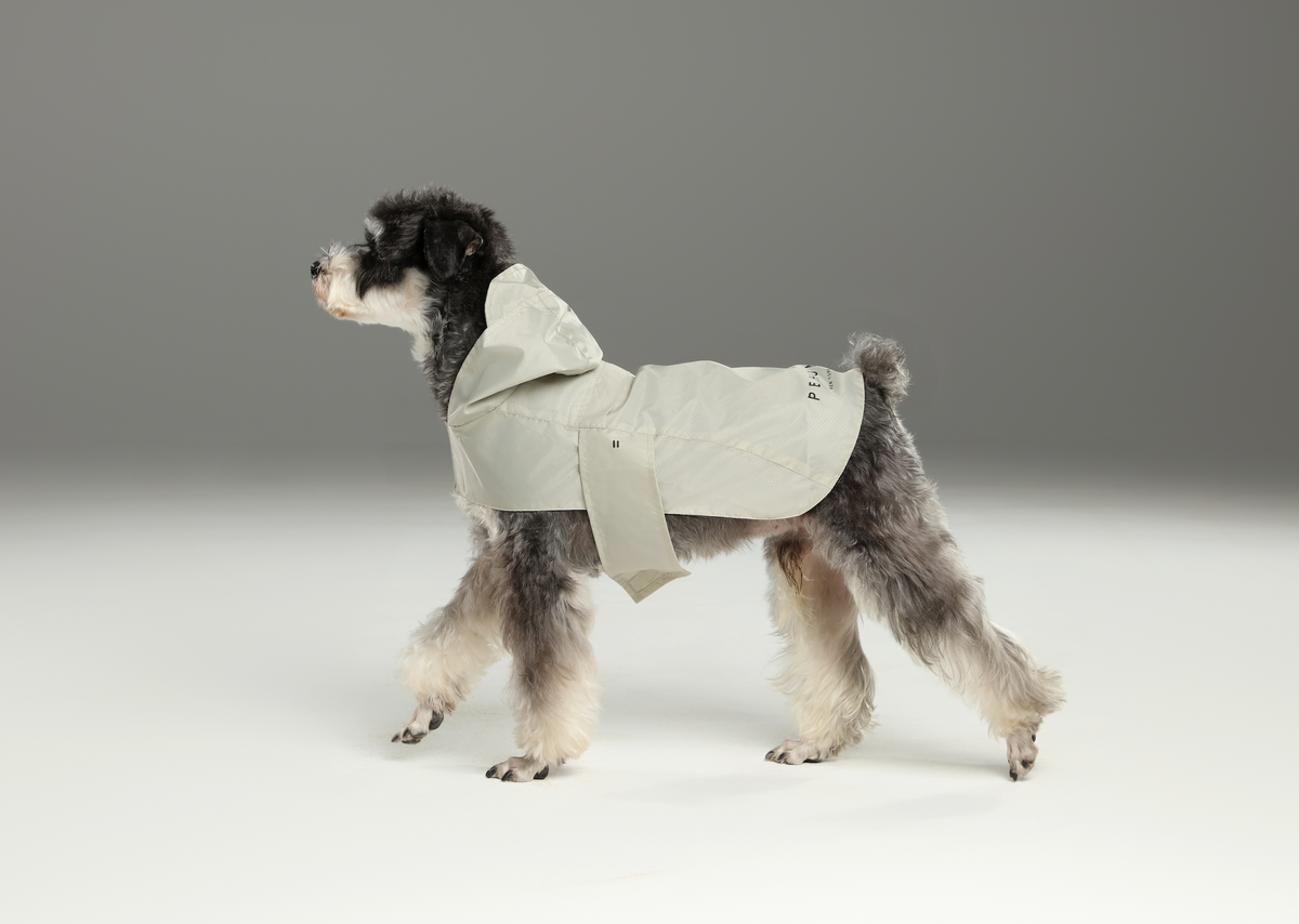 Beige capsule waterproof foldable dog raincoat cloak design with reflective strips adjustable straps