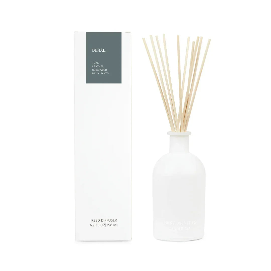 Denali reed diffuser with teak leather cedarwood and palo santo scent notes