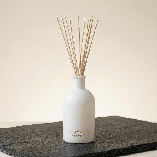 Denali reed diffuser with teak leather cedarwood and palo santo scent notes