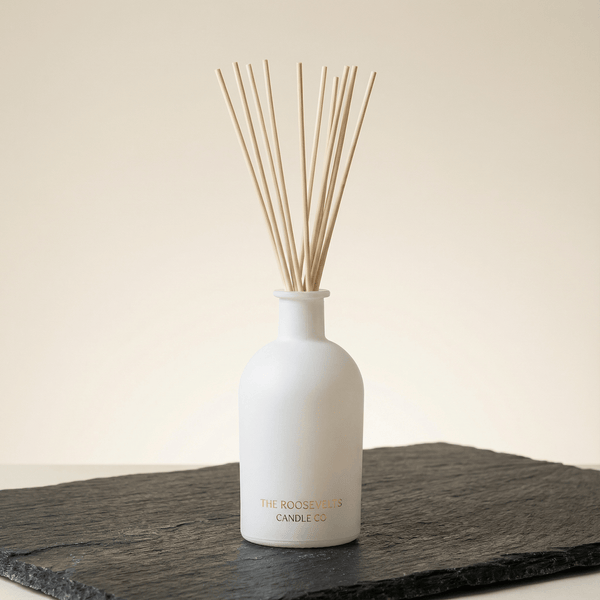 Denali reed diffuser with teak leather cedarwood and palo santo scent notes